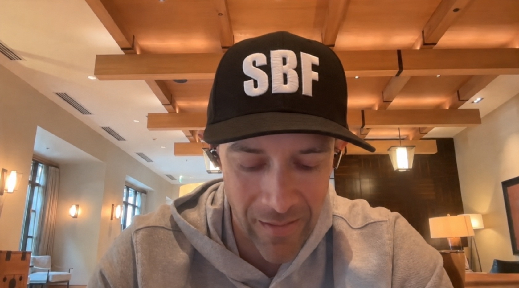 Ace wearing a hat with SBF lettering